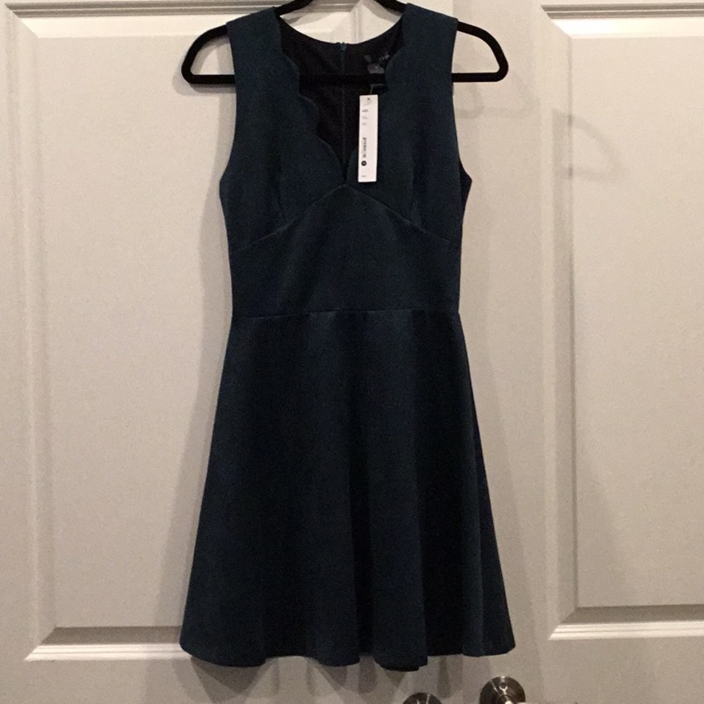 Scalloped v neck